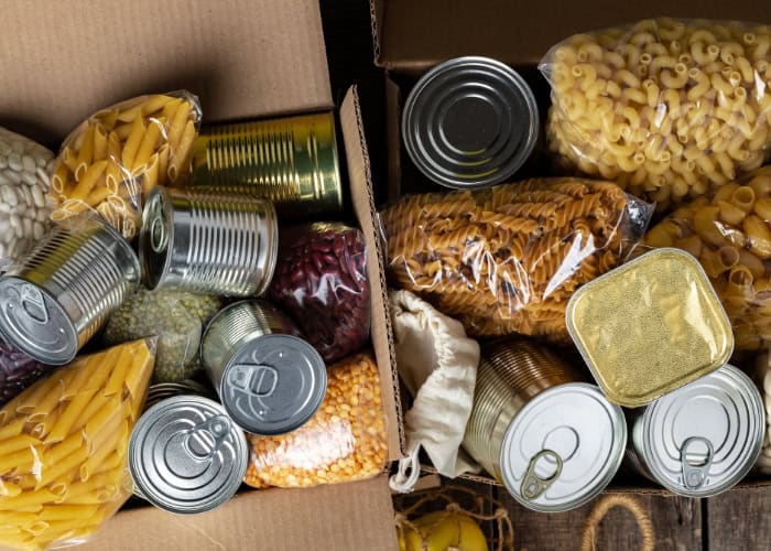 Cans and dry food goods in boxes