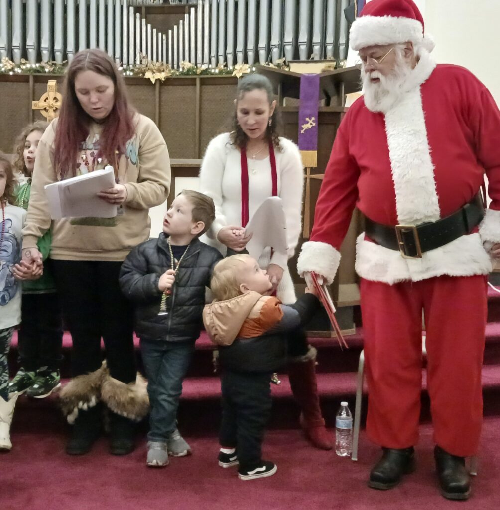 Group singing with Santa