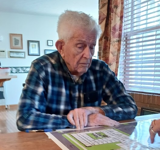 Jack Ream looking at building plans for Jack's House of Hope.