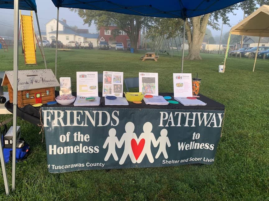 friends of the homeless and pathway to wellness promotional table